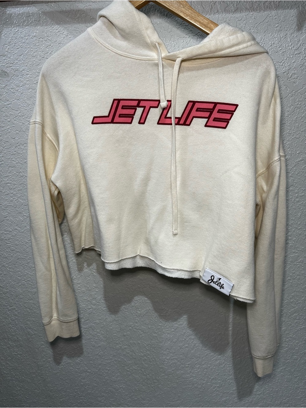 Jet Life Cream Cropped Hoodie with Pink Logo